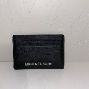 Black and silver Michael Kors card holder